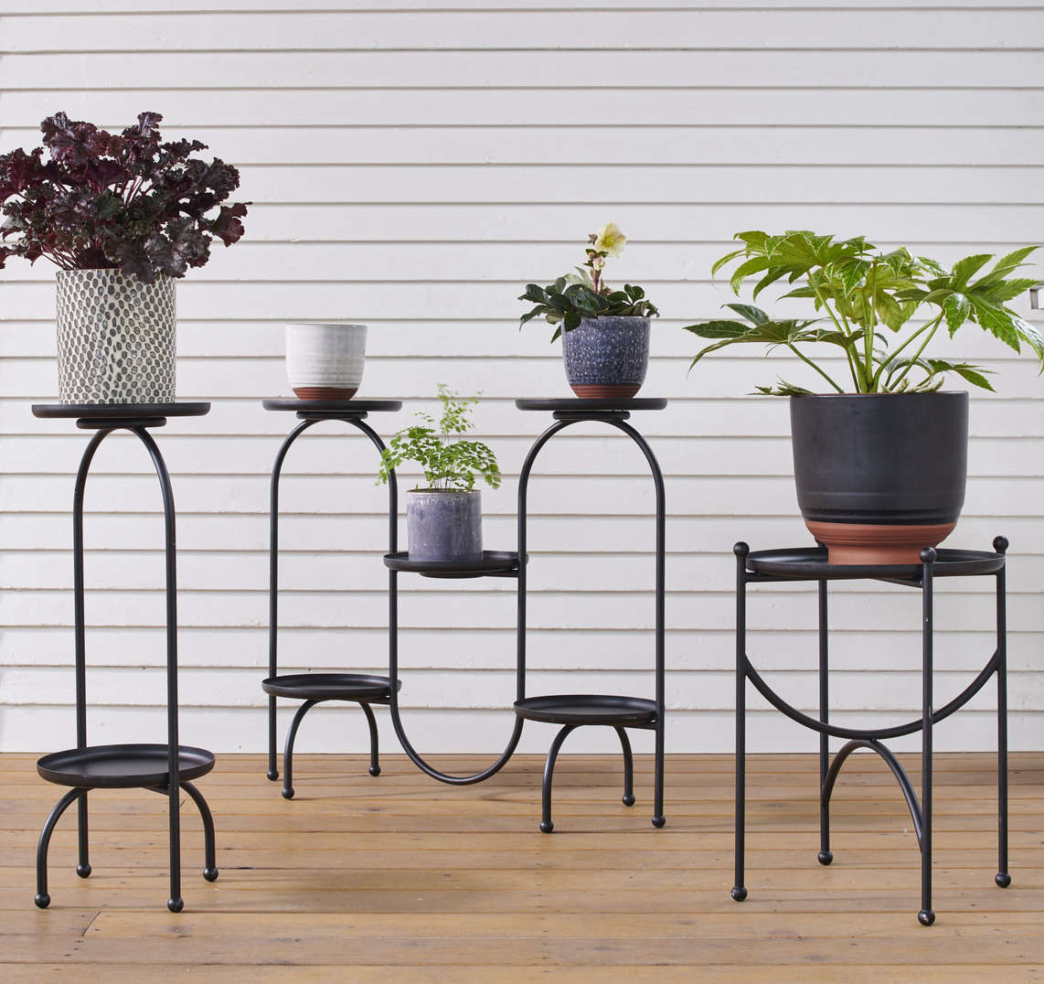 Rejuvenation’s got plant stands, too. Mix and match any of their petite planters on these Scandinavian-inspired Black Tray Plant Stands—available in one-tray ($9), two-tray ($data-src=