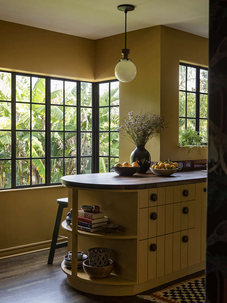 A moody but cheery kitchen from LA powerhouse Reath Design. Photograph by Laure Joliet, courtesy of Reath Design, from Kitchen of the Week: ‘SMILF’ Creator Frankie Shaw’s Newfangled Old-Fashioned Remodel by Reath Design.