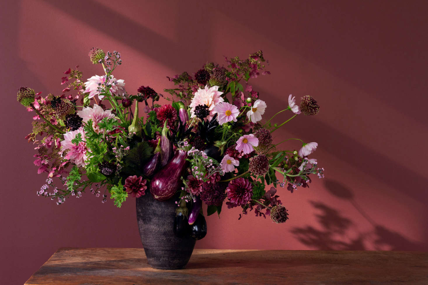Eggplants, on skewers, can be used to add an element of surprise to any floral arrangement.