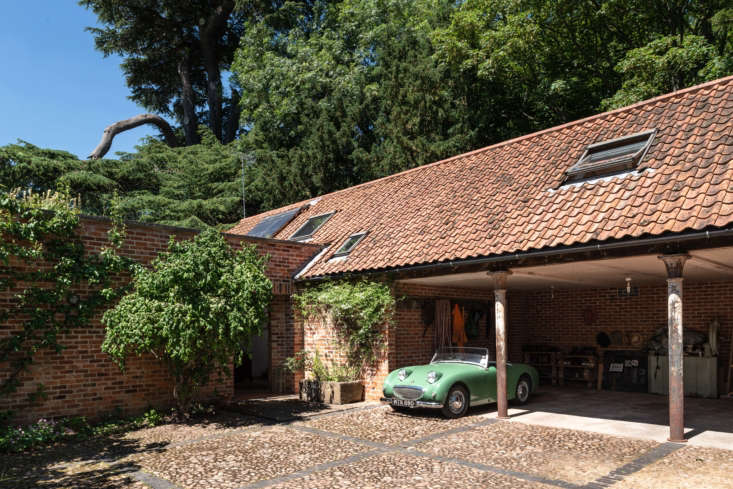 From the carport and entrance, the house appears to be a modest single-level building, albeit one with major curb appeal.