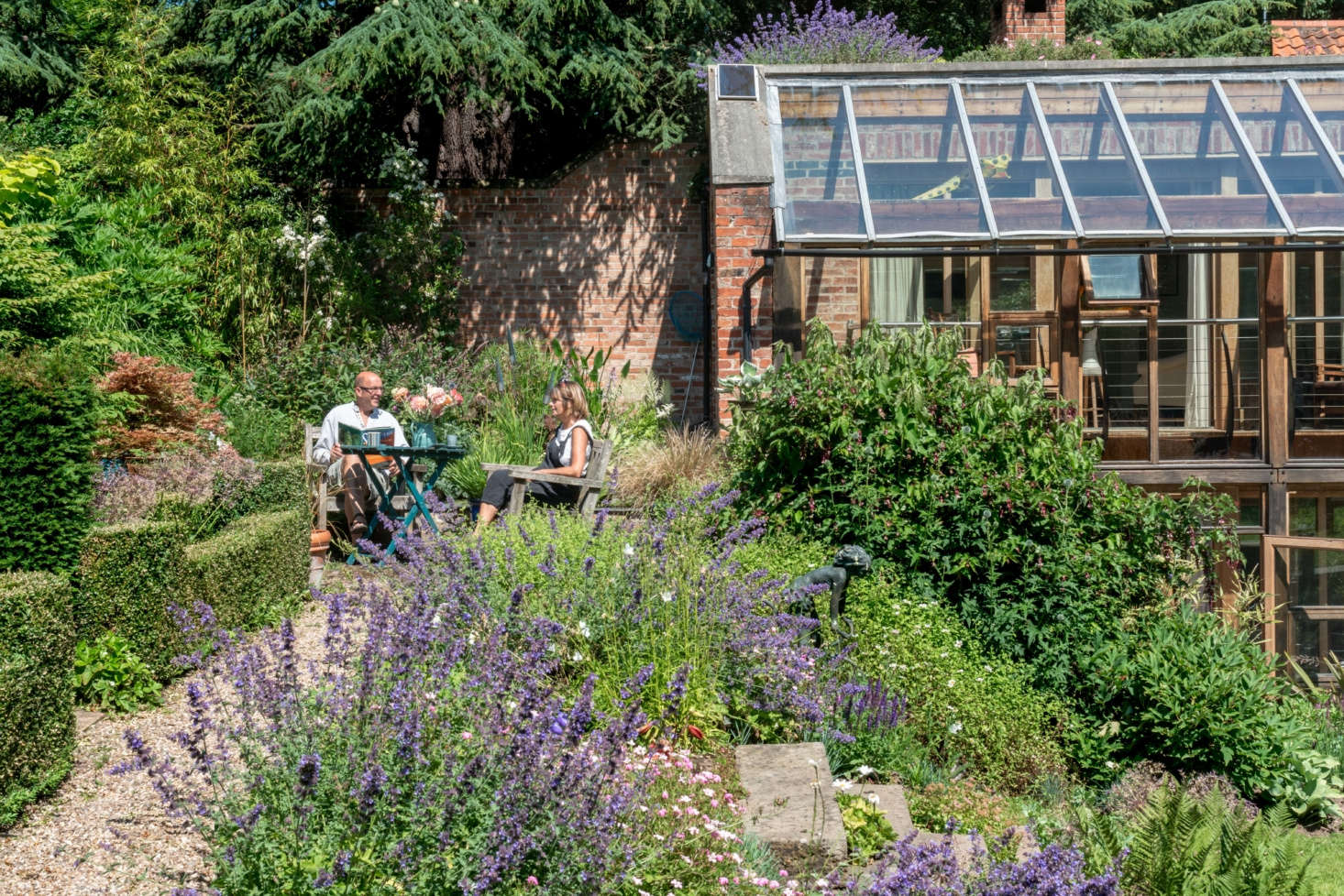 While much of the garden was designed to encourage play and creativity, there are also ample areas for rest and contemplation, like this nook, what Anna calls their 