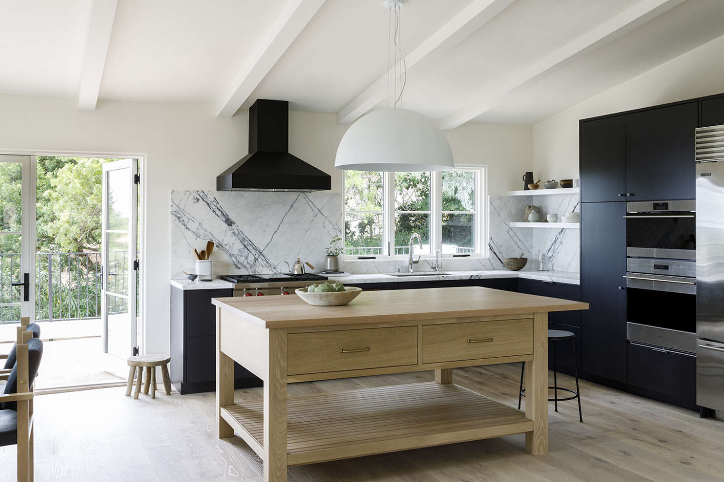 Black and white is never a bad idea in a kitchen. See more of this in A Serene, “Well-Balanced” House for a Violinist and an ER Doctor, Inspired by Vivaldi. Photograph by Laure Joliet.