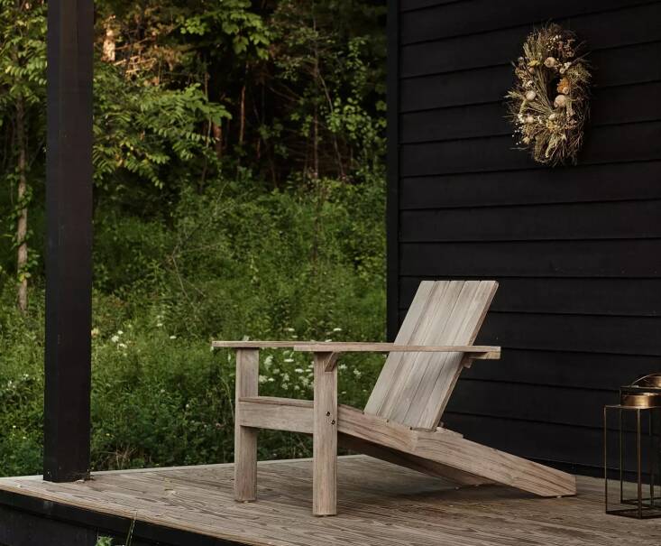 The Teak Adirondack Chair is pre-treated to resist wear from sun and rain. It\2\17;s available in two stains: natural and grey (pictured); \$748 at Terrain.