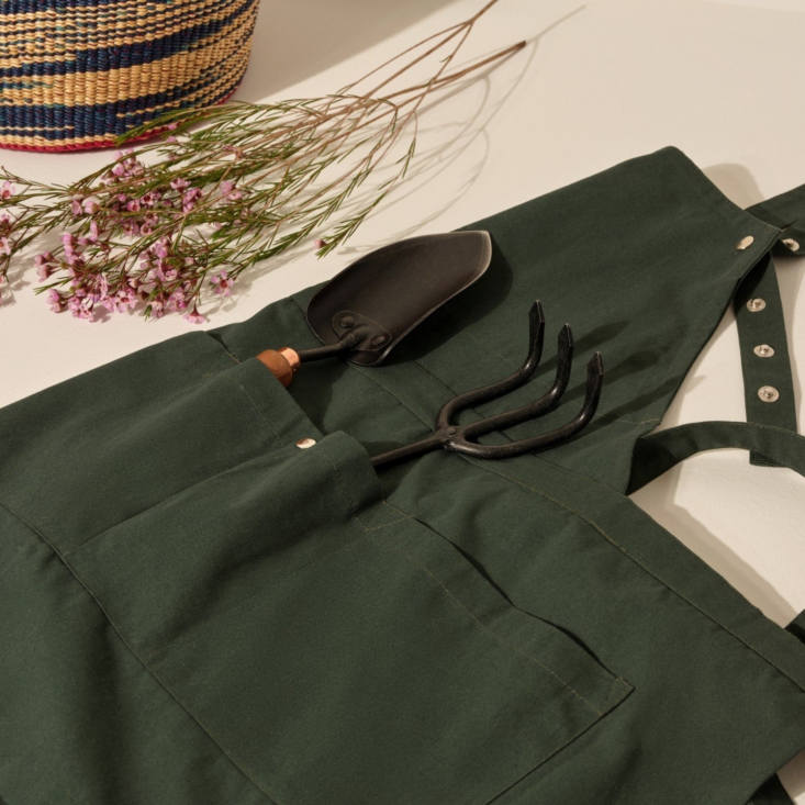 Tools at the ready in the Creative and Garden Apron, shown here in dark green.