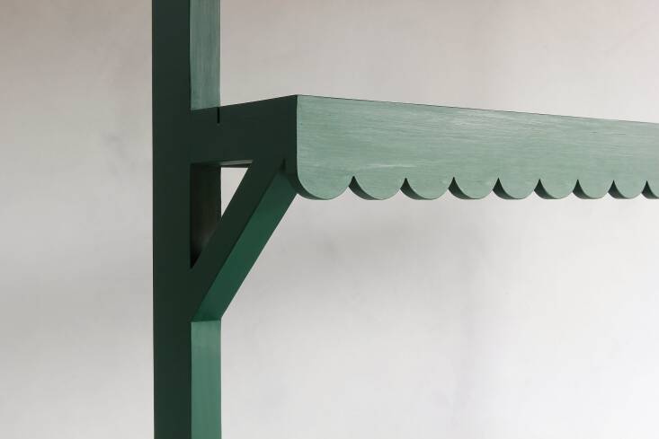 The Studio Green color plus the scalloping are what make this potting table especially appealing to me. (Scalloping is back in the design world; see Trend Alert: \2\1st Century Scalloping.)