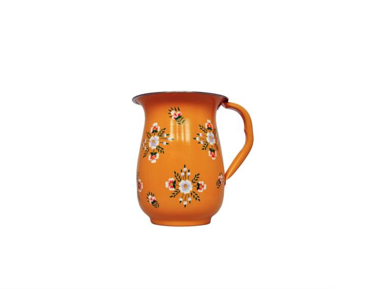 The Tara Hand-Painted Enamel Jug at Jasmine White is £\27.50 and comes in tangerine (shown), turquoise, and green.