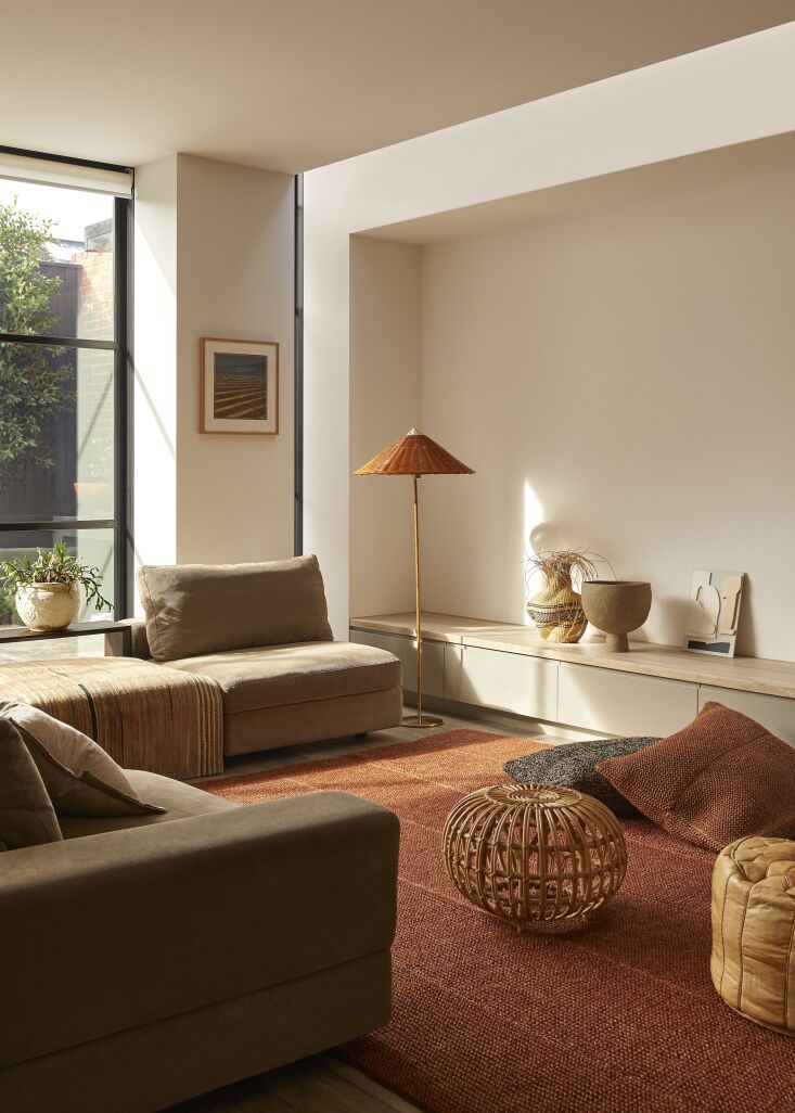 A burnt orange sisal rug in the aptly named Terra House. Photograph by Lillie Thompson, from Rising Design Star Brem Perera Introduces Warmth and Familiarity to a Sweeping New Build in Melbourne.