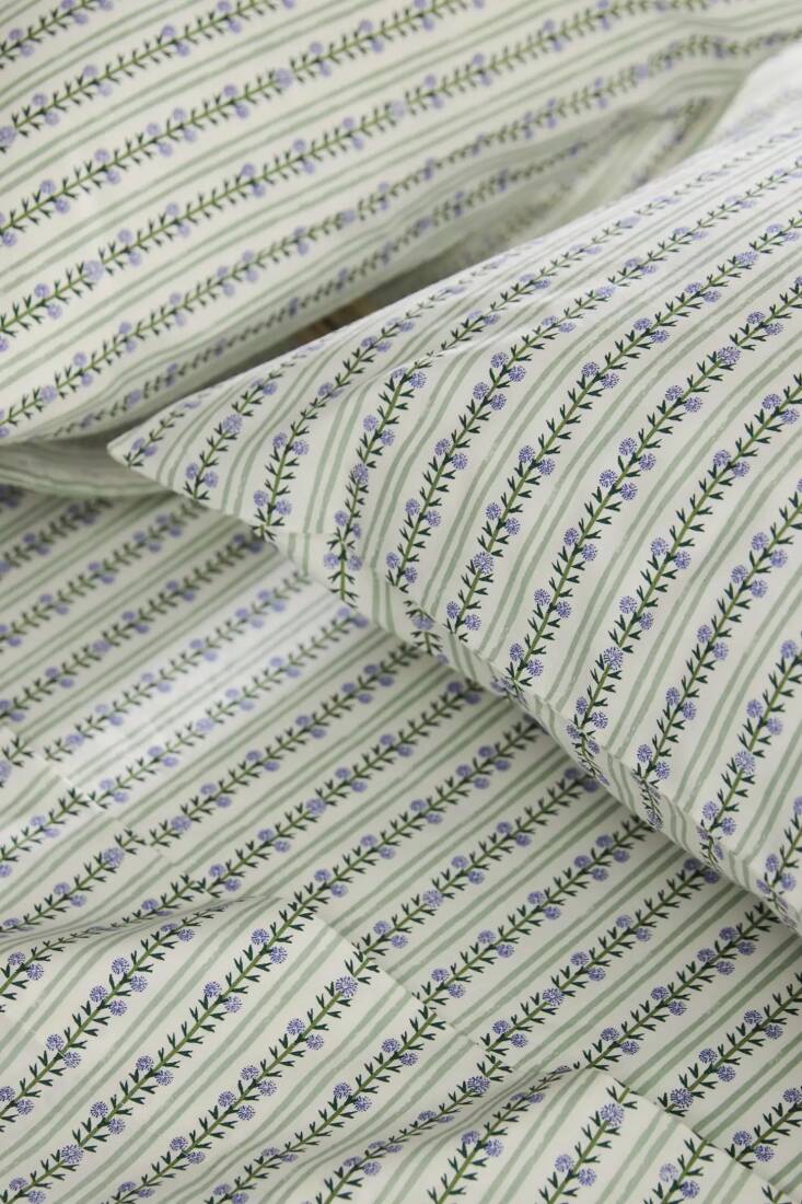 An Ellen Merchant Cottage Cotton Percale Sheet Set is \$\188 from Anthropologie in the US for a full-size set. Ellen Merchant Cottage Curtains start at £78 from Anthropologie in the UK.