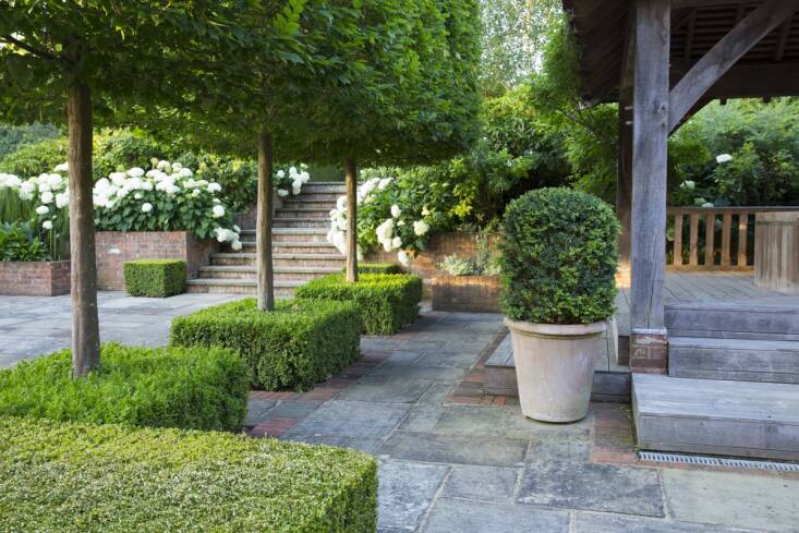 When patios are part of her design, Thompson sources local stone to make them feel rooted in place. Photograph by Rachel Warne.
