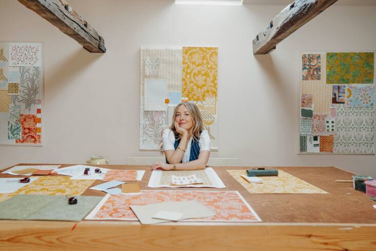 Merchant studied at Central Saint Martins and Camberwell College of Art and went on to earn her MA in textiles from The Royal College of Art. She opened her own studio in London in \20\2\1, and has since moved her operations to a barn in East Sussex.