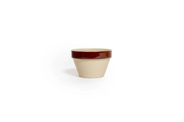 Channeling French kitchens, the Manufacture de Digoin Small Pot with Border can be used for many things, one of which is as a small herb pot; \$34.
