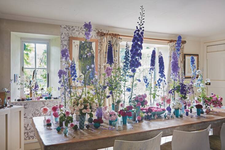 Spilsbury Farm in the month of June is a whirlwind of roses at every turn, including on Tania’s dining table, where tall delphiniums join in the merriment.