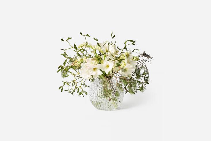 This classic heirloom-quality glass vase from Svenskt Tenn elevates any arrangement. Shop now.