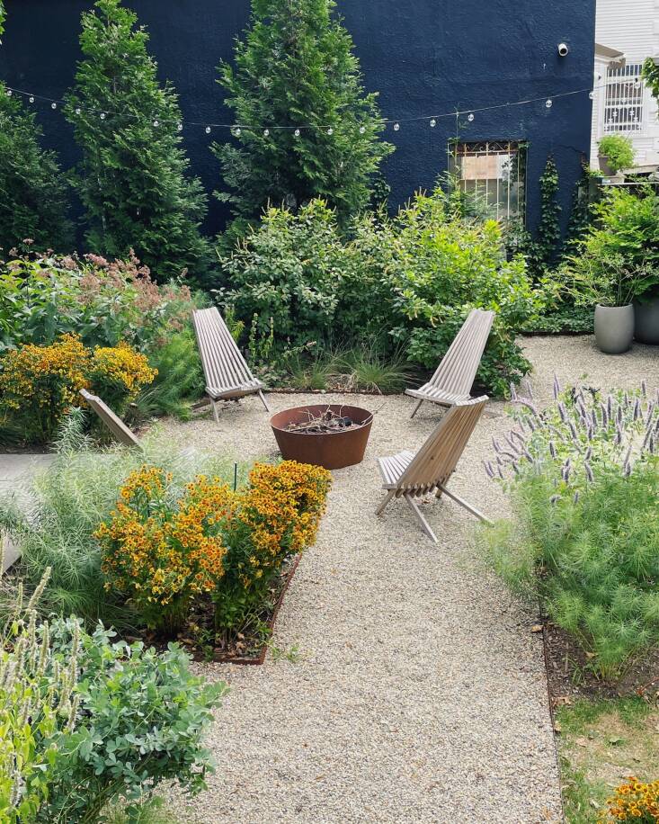 Many decisions were guided by the clients’ desire for a low-maintenance yard; for example, gravel does not need to be mowed and cushion-free furniture means not having to protect them in in inclement weather. This photo was taken a year after installation for more images, check out this post on Dirt Queen NYC’s Instagram.
