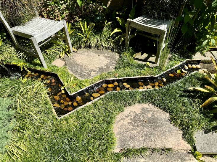 A favorite and relaxing element for Ann is the water feature in the side garden with its two ponds and connecting zigzag rill.
