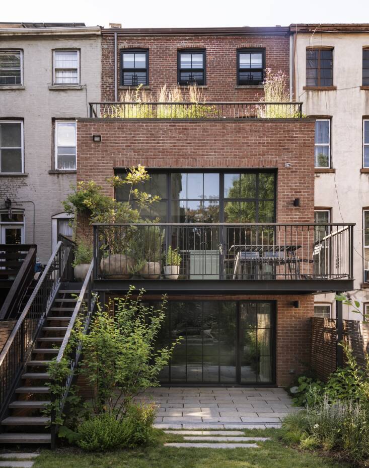 Architecture firm Bangia Agostinho Architecture designed the two-story rear extension and deck on the house. The renovation resulted in three different outdoor spaces for Farris to design: The backyard, a new deck, and a little terrace off of the primary bedroom that sits on the roof of the extension.