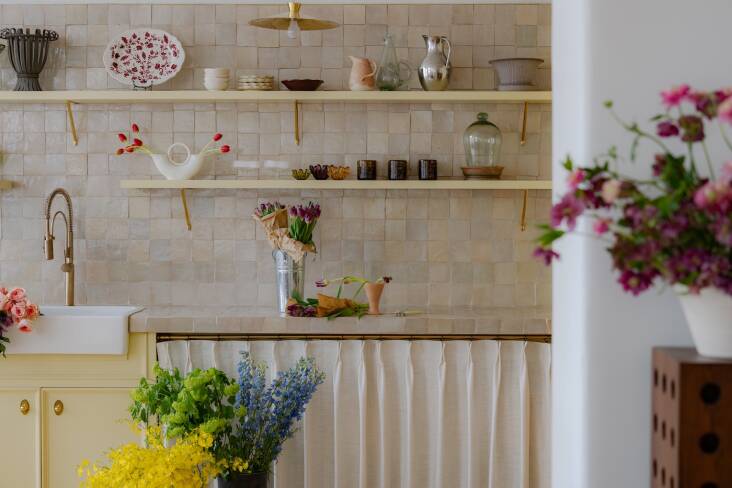 The tiles are Moroccan zellige from Tiles of Lucca, a New Jersey company Kelsie chose because she could drive to pick them up and \2\20;make sure the color variations all work.\2\2\1; The pale yellow cabinets are painted Farrow & Ball\2\17;s Bombazine.