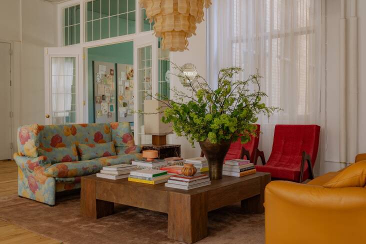 Kelsie brainstormed the House of Three plans with her husband, Justin Fine, a consultant for tech consumer businesses, whose input led to the living area: \2\20;Justin loves a conversation pit.\2\2\1; The floral Cassina sofa, a vintage Italian design from Mid-Century LA, sets the tone; it was the first piece Kelsie bought for the space.