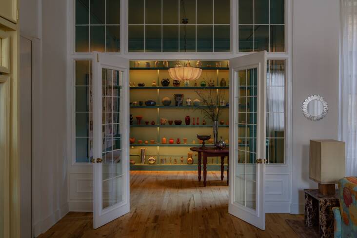 A \2\20;florist\2\17;s pantry\2\2\1; showcases Kelsie\2\17;s ever-growing collection of vases, new and old—and serves as an intriguing jewel box right off the entry. Two of Kelsie\2\17;s go-to sources for ceramics are the antiques malls and Goodwill in her hometown of Cumberland, Maryland, (her sister cases the offerings for her every Monday) and Apotheca Botanica of Mexico City (Kelsie and her husband and their four-year-old daughter spend weeks at a time in CDMX and always return with new pieces).