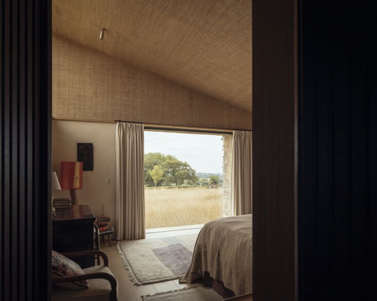 Photograph by Jim Stephenson for Tuckey Design Studio, from HHouse of the Earth: A Rammed-Earth Country House in Wiltshire by Tuckey Design Studio.