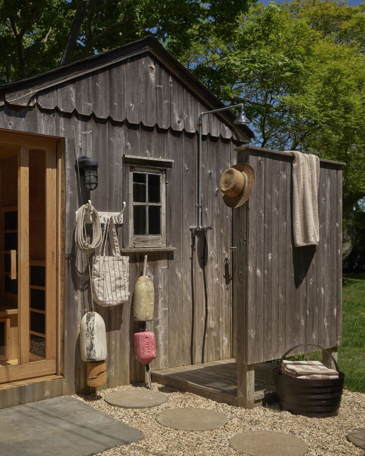Could this outdoor shower setup be any more charming? Photograph from A Shelter Island Holiday Rental Where Everything Is for Sale.