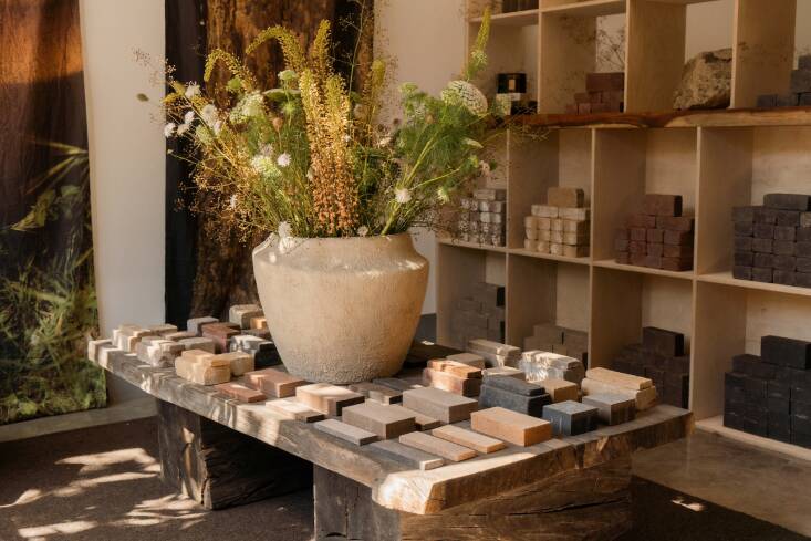 Sedlacek used one of ORCA’s Alluvian planters as an oversized vase on the main showroom table, which is an ORCA design crafted from reclaimed redwood with a fallen coast live oak for the base.